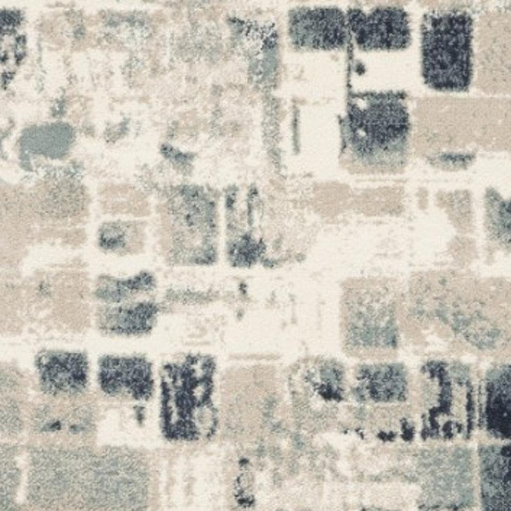 5' X 8' Blue and Beige Abstract Area Rug
