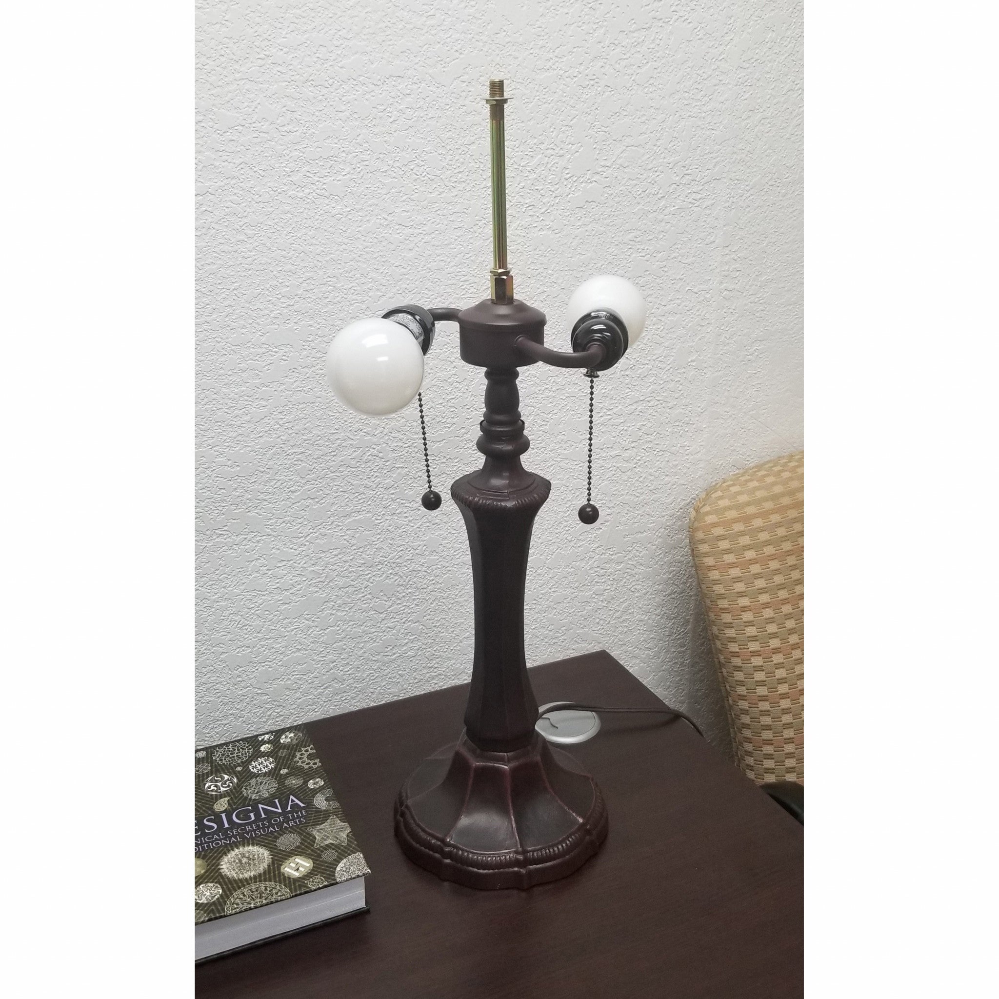 23" Dark Brown Metal Two Light Candlestick Table Lamp With White Shade