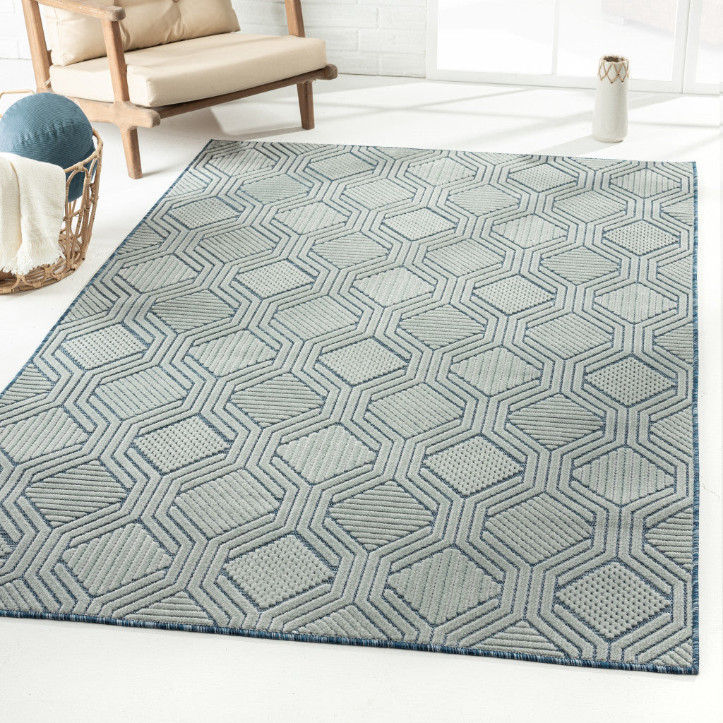 5' X 7' Light Blue And Navy Geometric Stain Resistant Area Rug