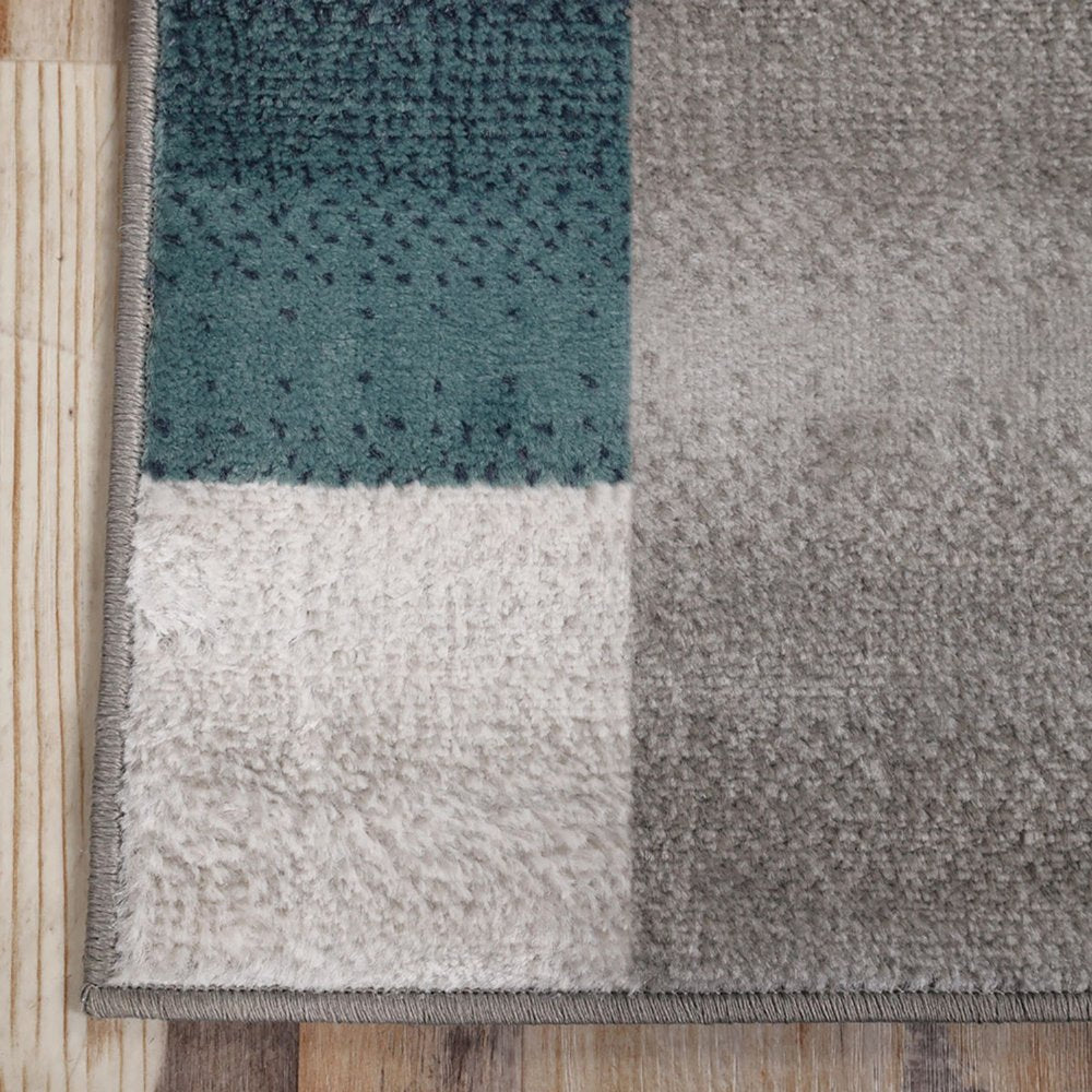 5' X 8' Teal And Ivory Patchwork Area Rug