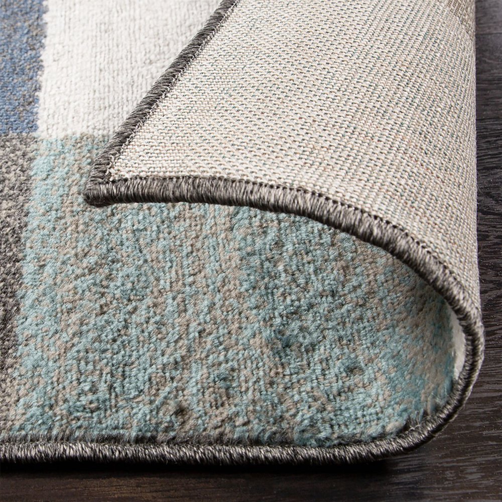 5' X 8' Teal Ivory And Gray Geometric Area Rug