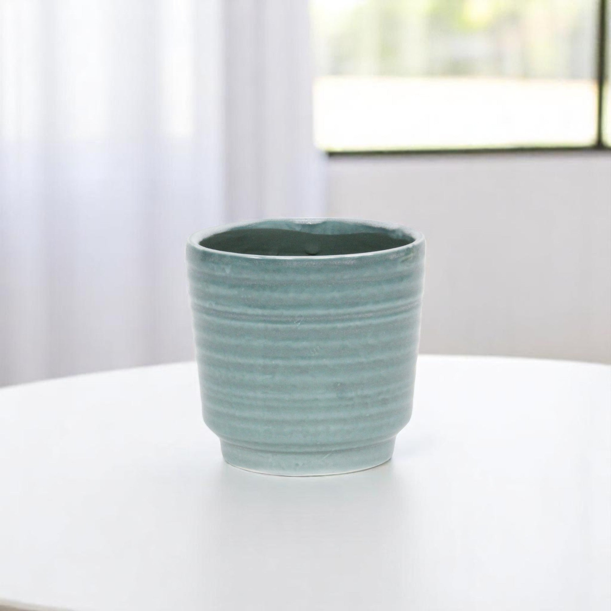 Green Ceramic 23 Ounce Striped Round Distressed Pot Planter
