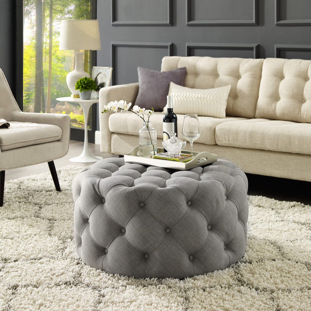 33" Beige Linen  Rolling Tufted Round Cocktail Ottoman