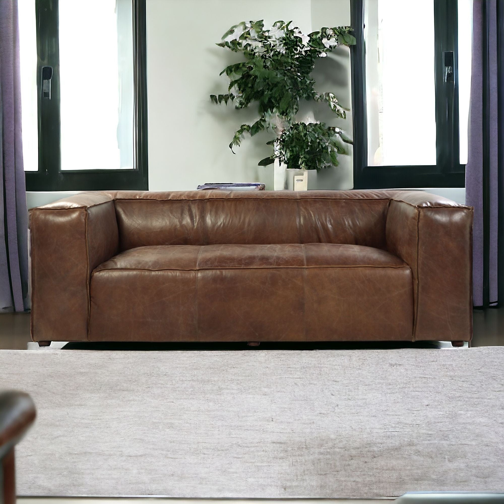 98" Brown Top Grain Leather And Black Sofa