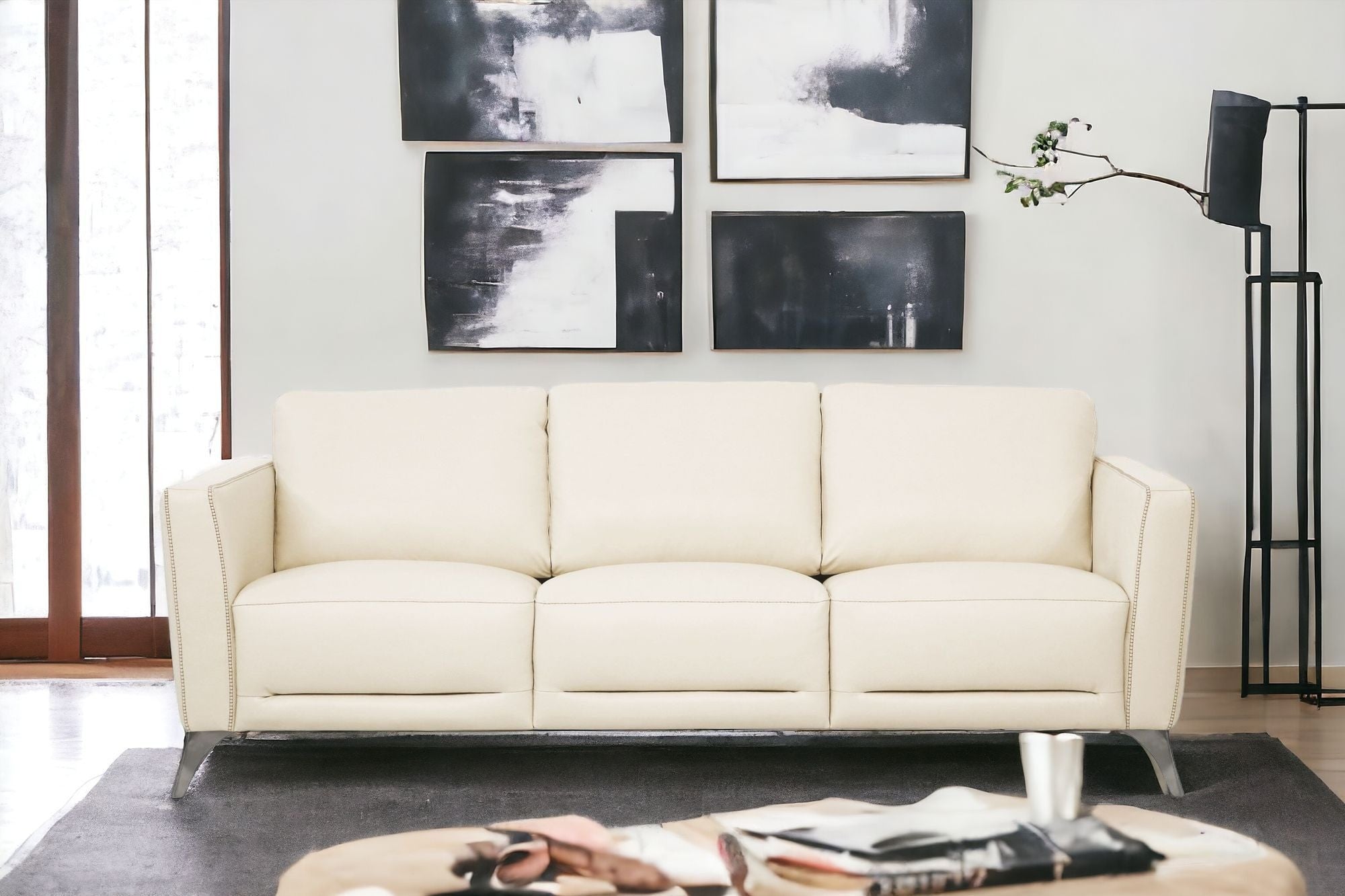 83" Cream Leather Sofa With Black Legs