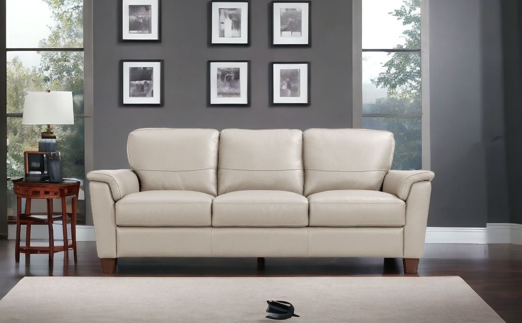 85" Beige Leather And Black Sofa