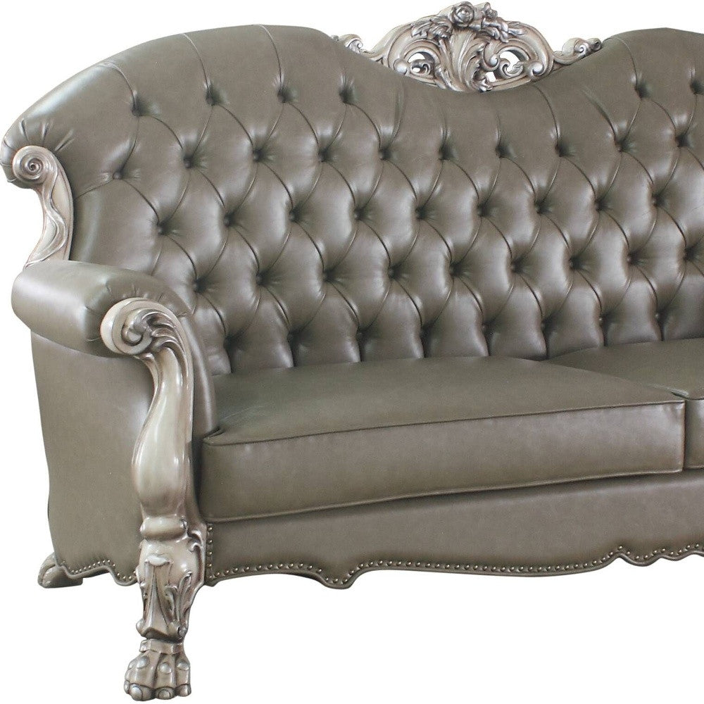 96" Bone Faux Leather Sofa And Toss Pillows With White Legs