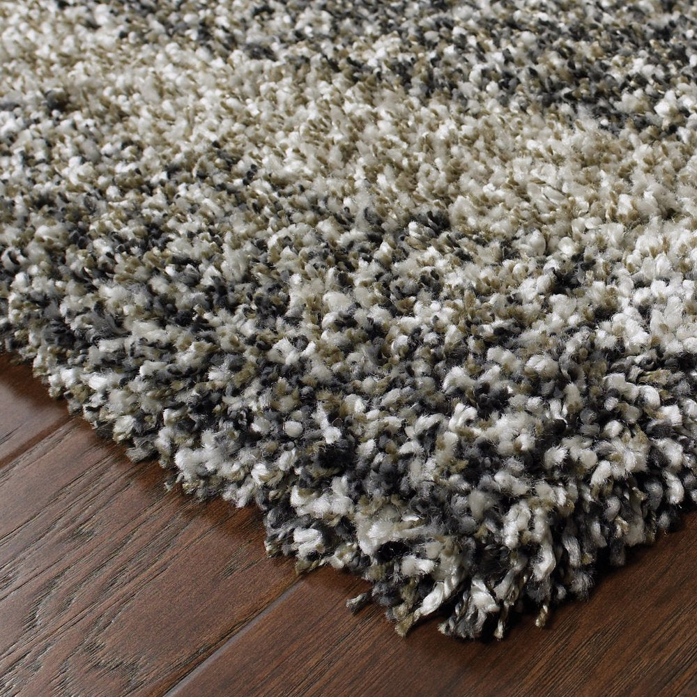 5' X 8' Charcoal Silver And Grey Abstract Shag Power Loom Stain Resistant Area Rug