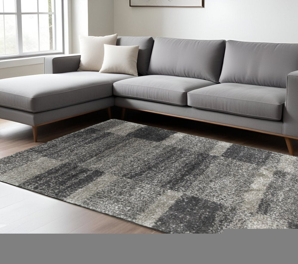 10' X 13' Charcoal Silver And Grey Geometric Shag Power Loom Stain Resistant Area Rug