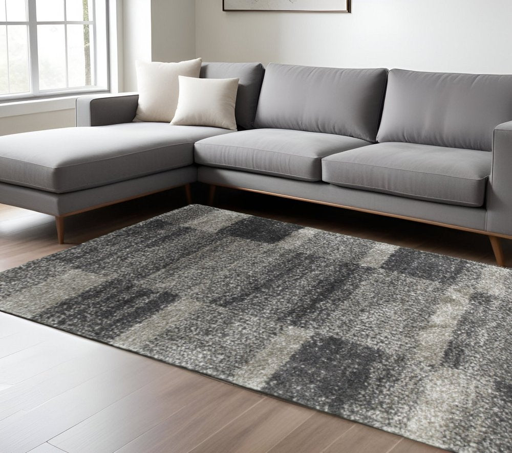 10' X 13' Charcoal Silver And Grey Geometric Shag Power Loom Stain Resistant Area Rug