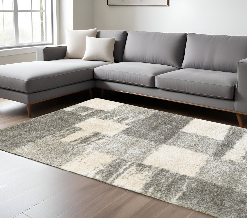 8' X 11' Grey Ivory And Silver Geometric Shag Power Loom Stain Resistant Area Rug