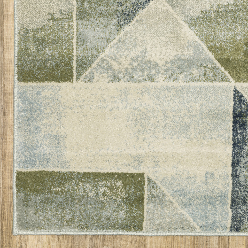 6' X 9' Blue Green Grey Gold And Ivory Geometric Power Loom Stain Resistant Area Rug