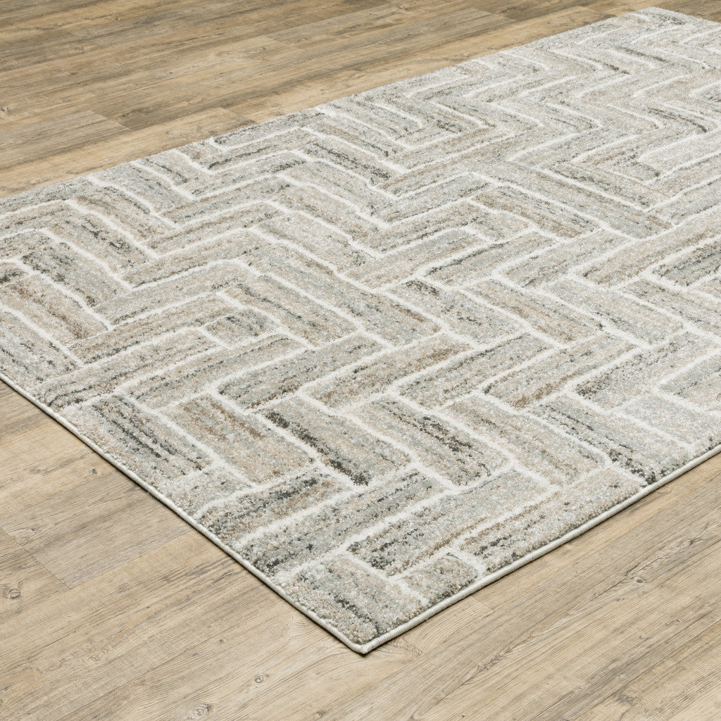 10' X 13' Ivory Beige Grey Brown Pale Blue And Charcoal Geometric Power Loom Stain Resistant Area Rug