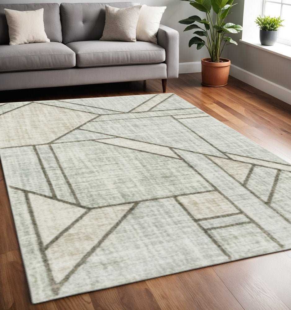 5' X 8' Gray And Ivory Geometric Power Loom Area Rug