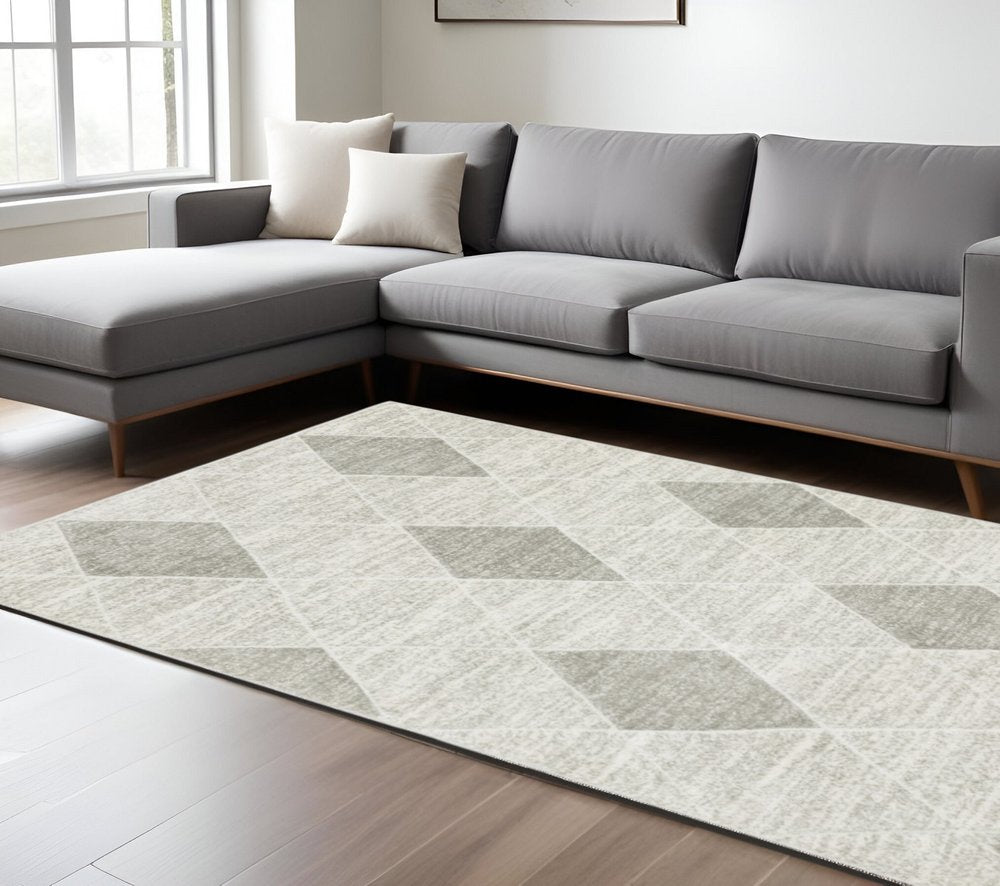 7' X 10' Gray And Ivory Geometric Area Rug