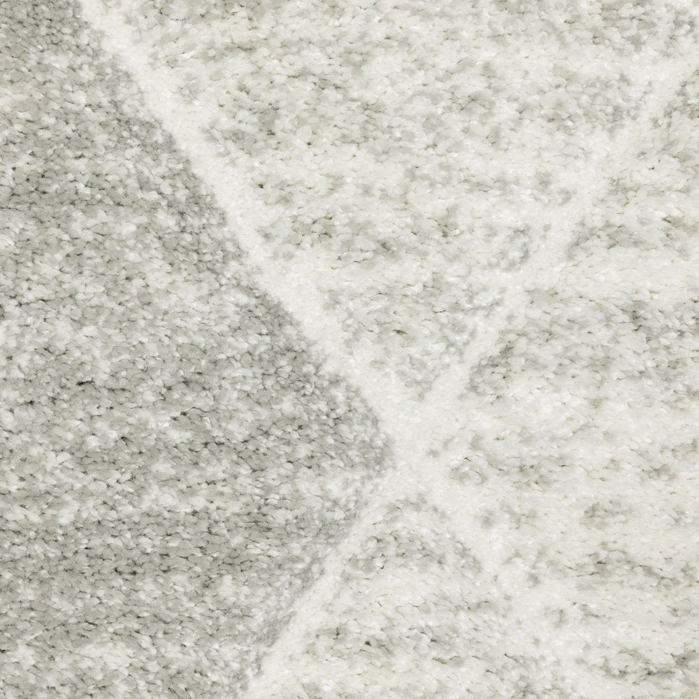 7' X 10' Gray And Ivory Geometric Area Rug