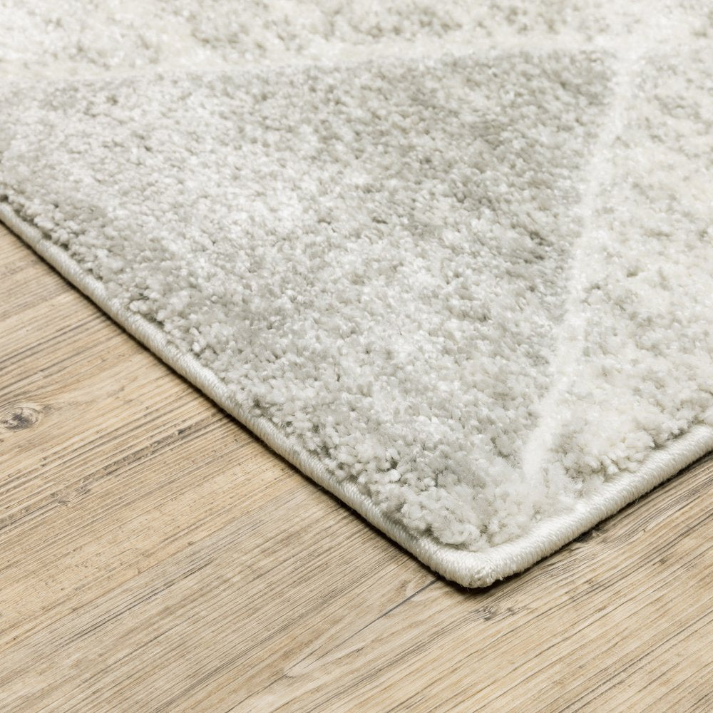 8' X 11' Gray And Ivory Geometric Area Rug