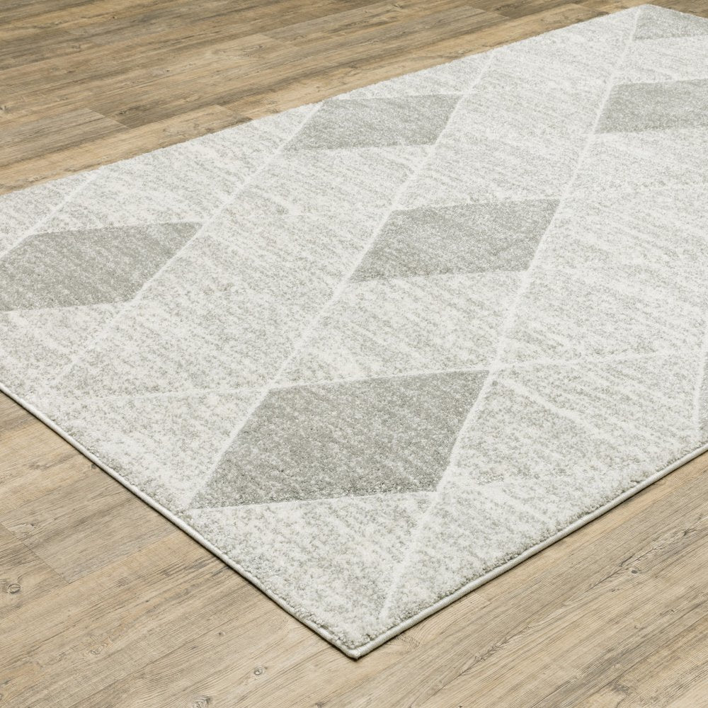 8' X 11' Gray And Ivory Geometric Area Rug