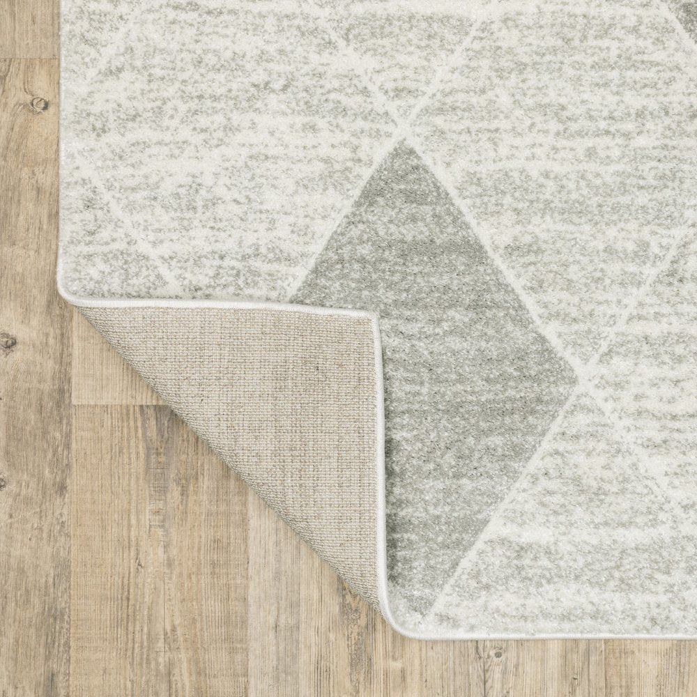 8' X 11' Gray And Ivory Geometric Area Rug