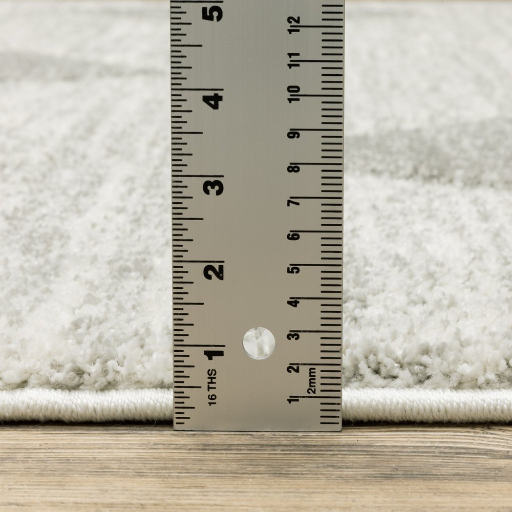 8' X 11' Gray And Ivory Geometric Area Rug