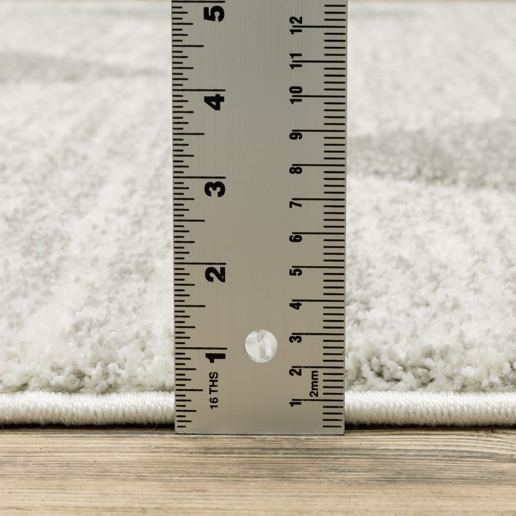 8' X 11' Gray And Ivory Geometric Area Rug