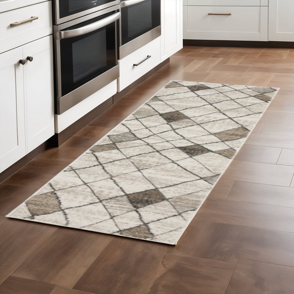 2' X 8' Beige Grey Tan And Brown Geometric Power Loom Stain Resistant Runner Rug