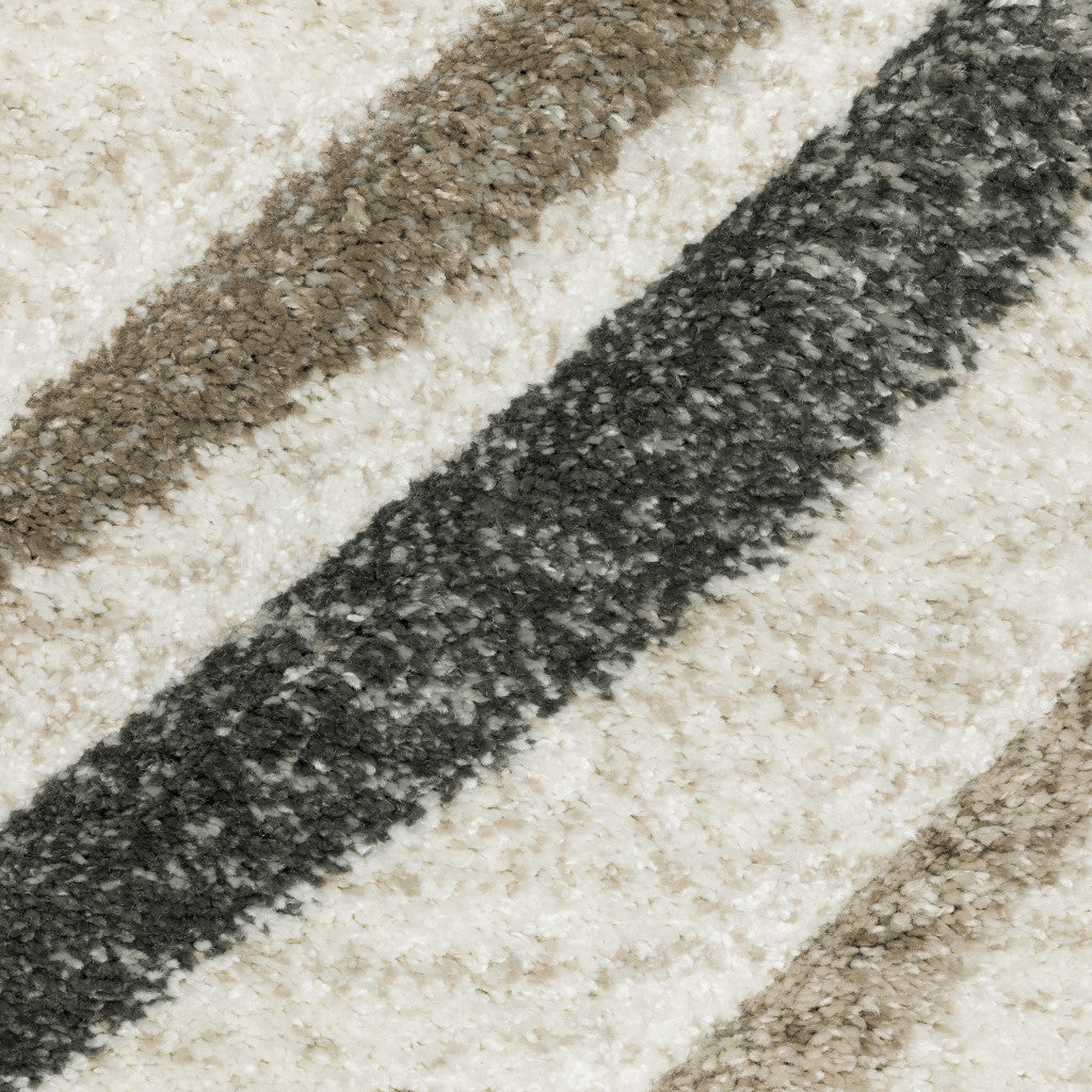 5' X 8' Beige Grey Brown Sage Pale Blue Tan And Charcoal Abstract Power Loom Stain Resistant Area Rug