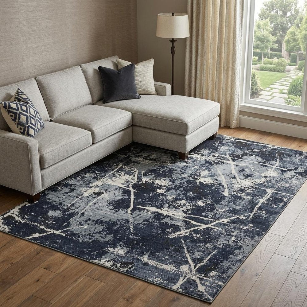 7' X 10' Blue Gray And Black Abstract Area Rug