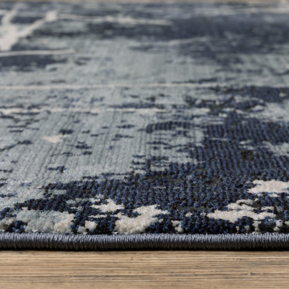 7' X 10' Blue Gray And Black Abstract Area Rug