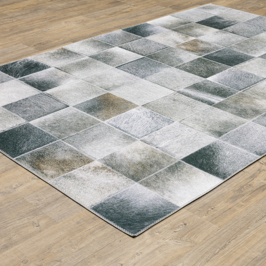 5' X 7' Grey Charcoal Brown And Beige Geometric Power Loom Stain Resistant Area Rug