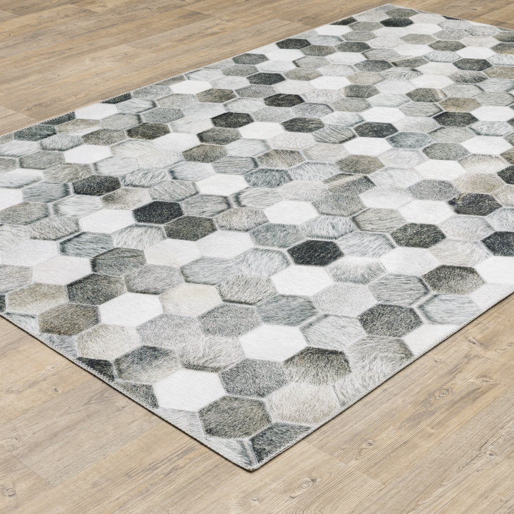 5' X 7' Grey Charcoal Brown Tan And Ivory Geometric Power Loom Stain Resistant Area Rug