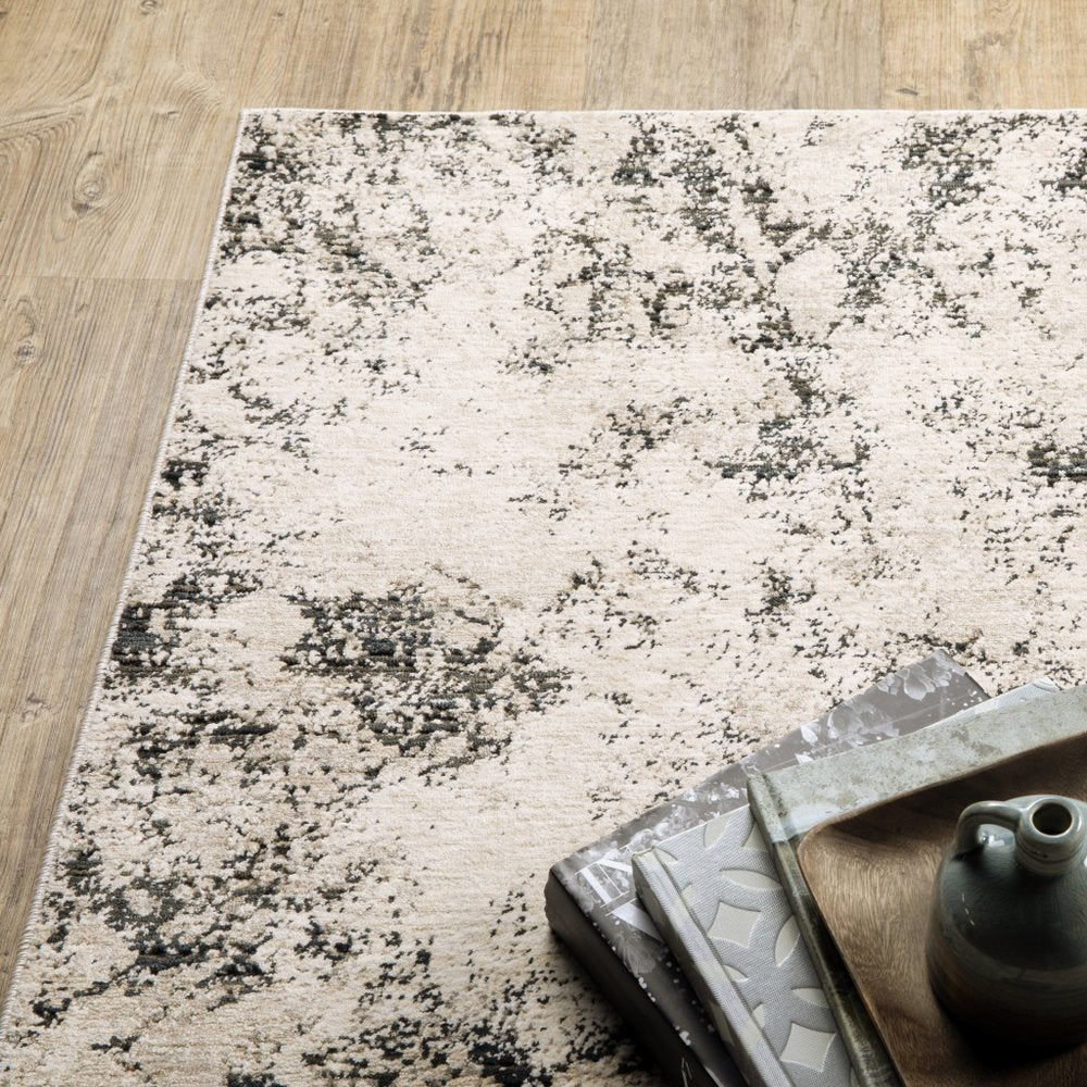 8' X 11' Ivory And Gray Abstract Area Rug