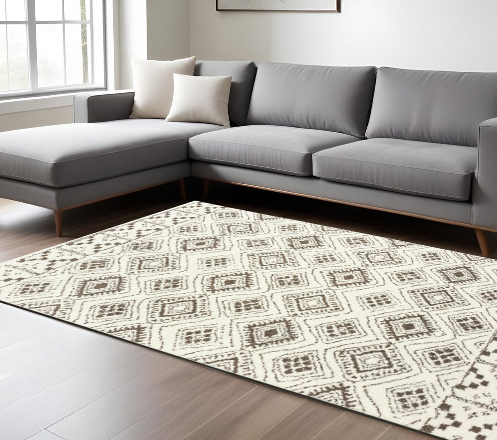 7' X 10' Ivory And Brown Geometric Shag Area Rug