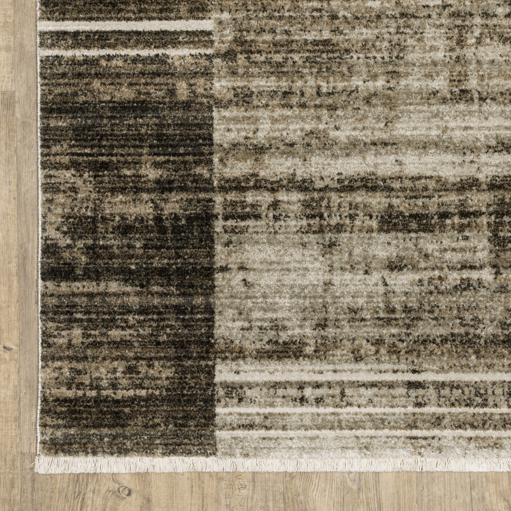 8' X 11' Beige Charcoal Brown Grey Tan Gold And Blue Geometric Power Loom Stain Resistant Area Rug With Fringe