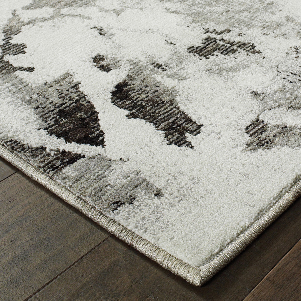 5' X 7' Gray and White Abstract Power Loom Area Rug