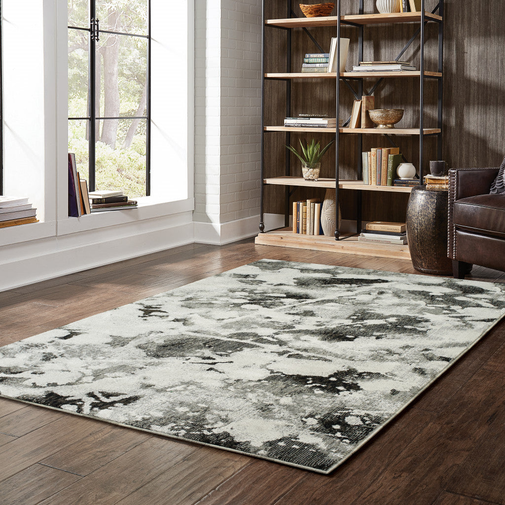 9' X 12' Charcoal And White Abstract Power Loom Stain Resistant Area Rug