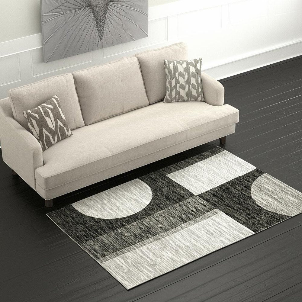 5' X 7' Gray and Ivory Geometric Power Loom Area Rug