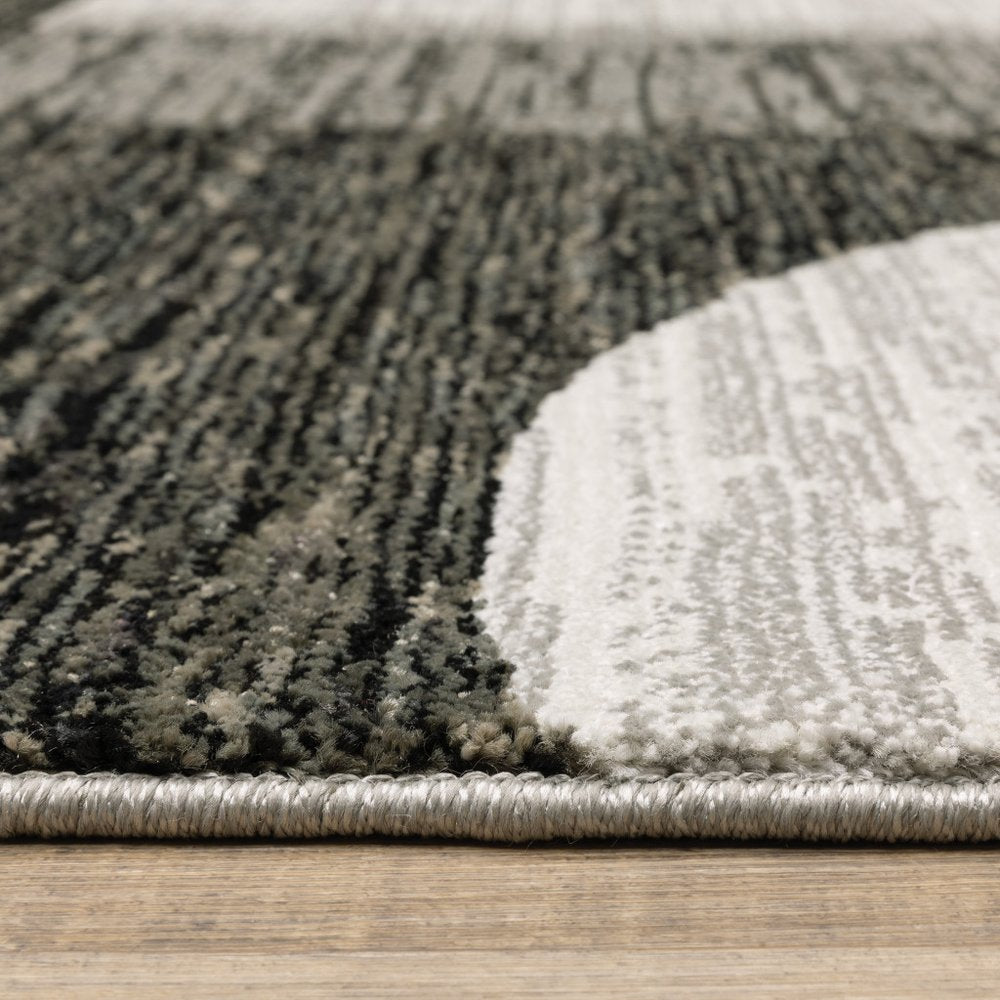 7' X 10' Gray and Ivory Geometric Power Loom Area Rug