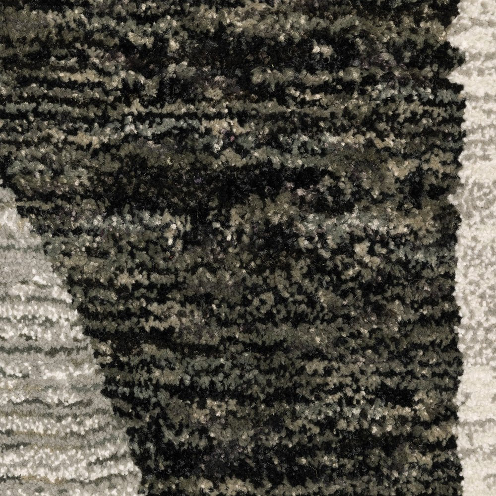 7' X 10' Gray and Ivory Geometric Power Loom Area Rug