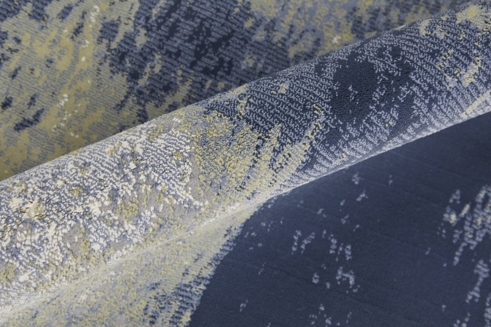 9' X 12' Blue Green And Ivory Abstract Distressed Area Rug