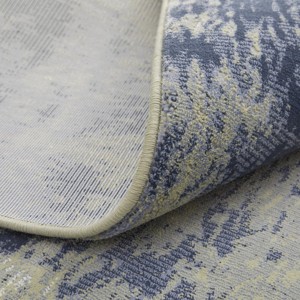 9' X 12' Blue Green And Ivory Abstract Distressed Area Rug