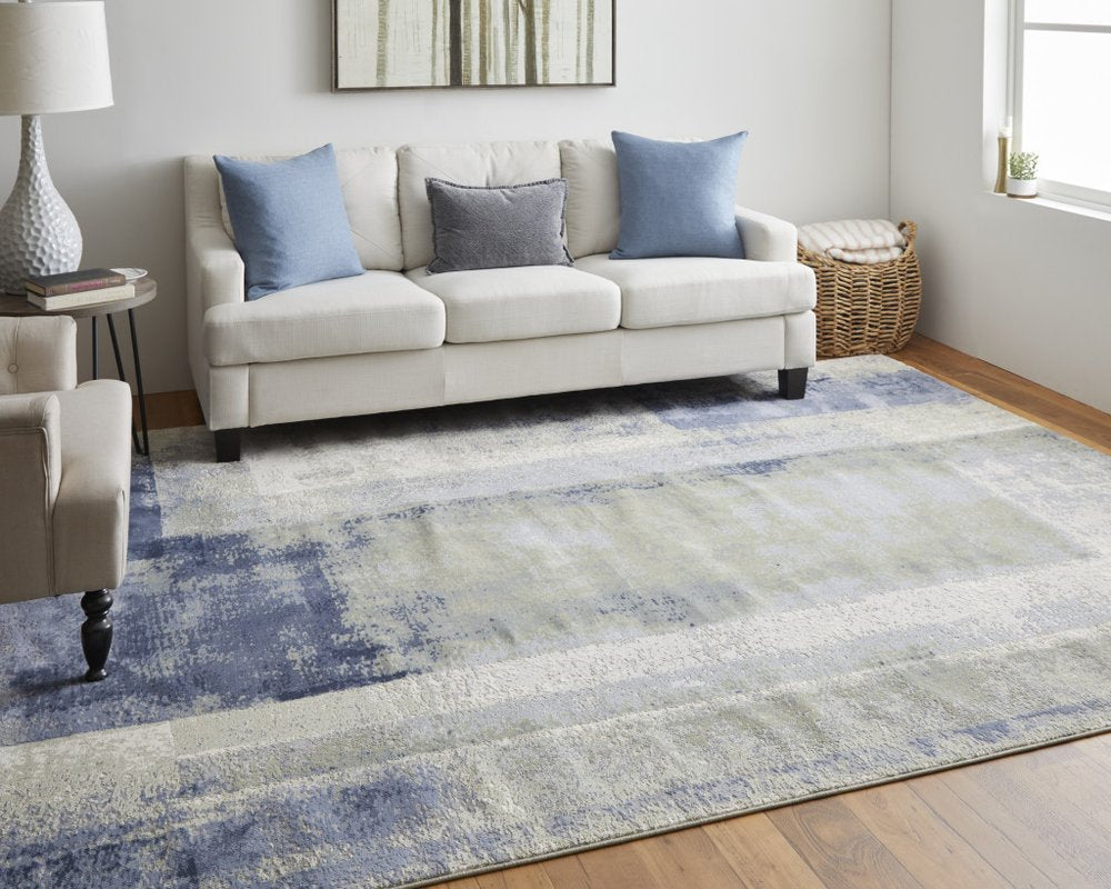 9' X 12' Blue Green And Ivory Abstract Distressed Area Rug
