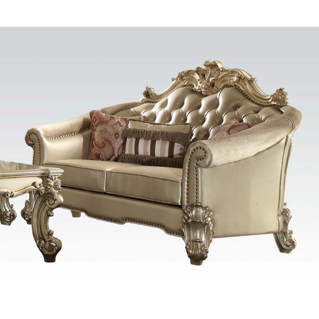 67" Bone And Gold Faux Leather Loveseat and Toss Pillows