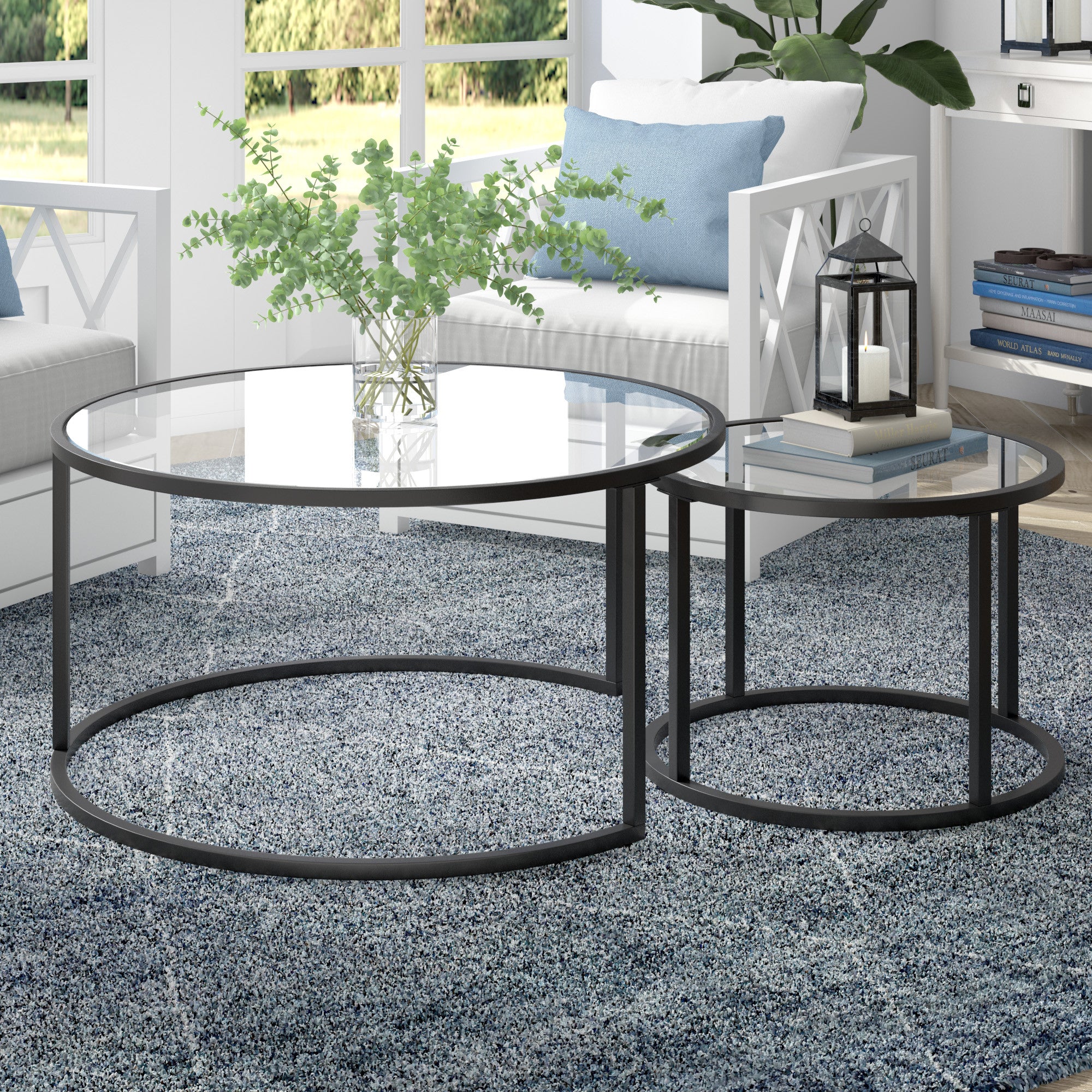 Set of Two Black Glass And Steel Round Frame Nested Coffee Tables