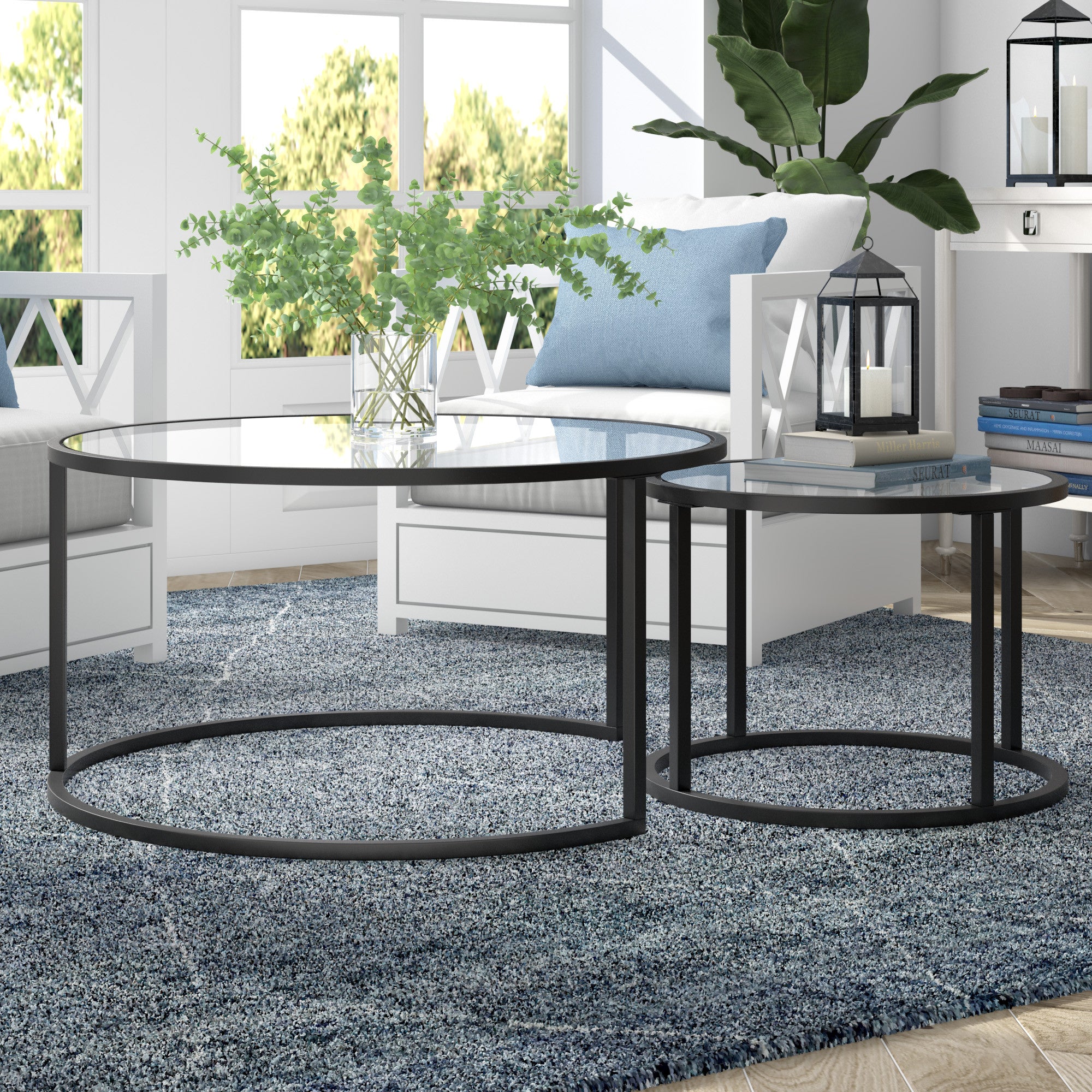 Set of Two Black Glass And Steel Round Frame Nested Coffee Tables