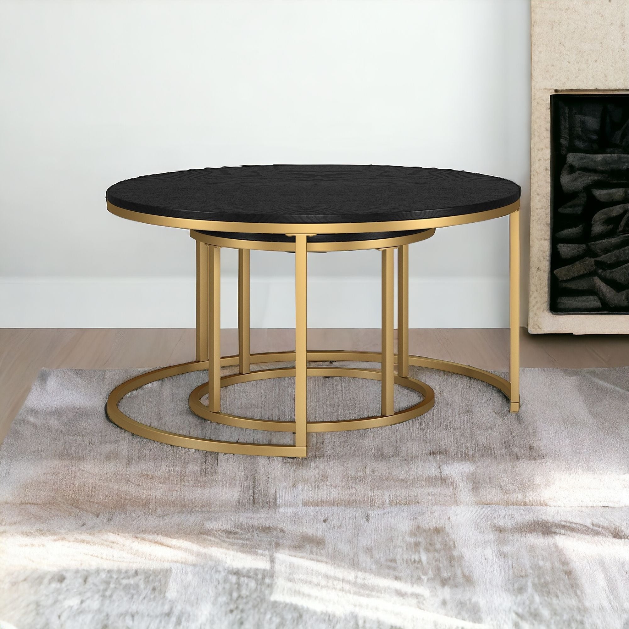 Set of Two 35" Black And Gold Steel Round Nested Coffee Tables