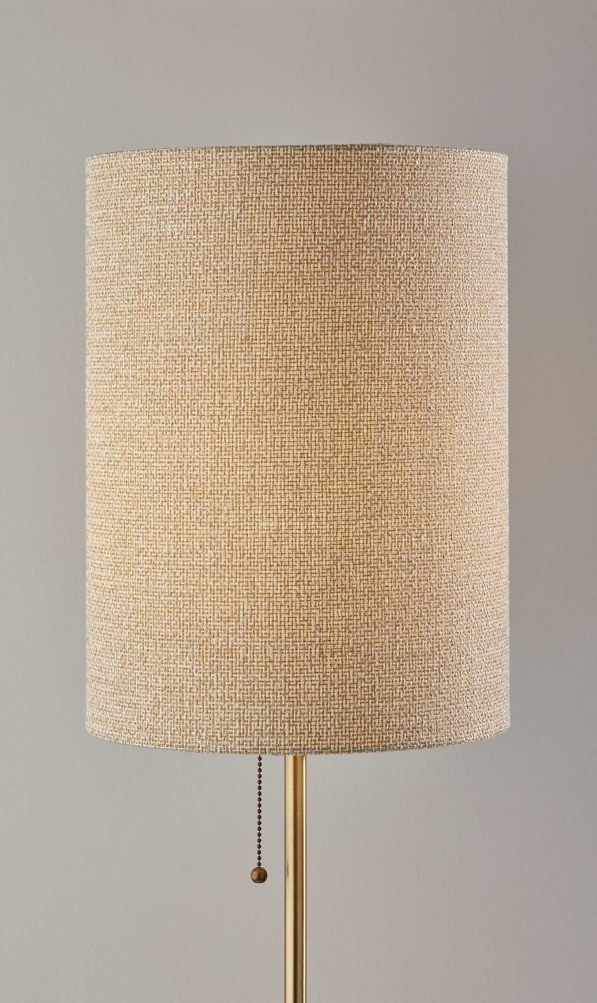 28" Black and Gold Metal Cylinder Table Lamp With Beige Drum Shade