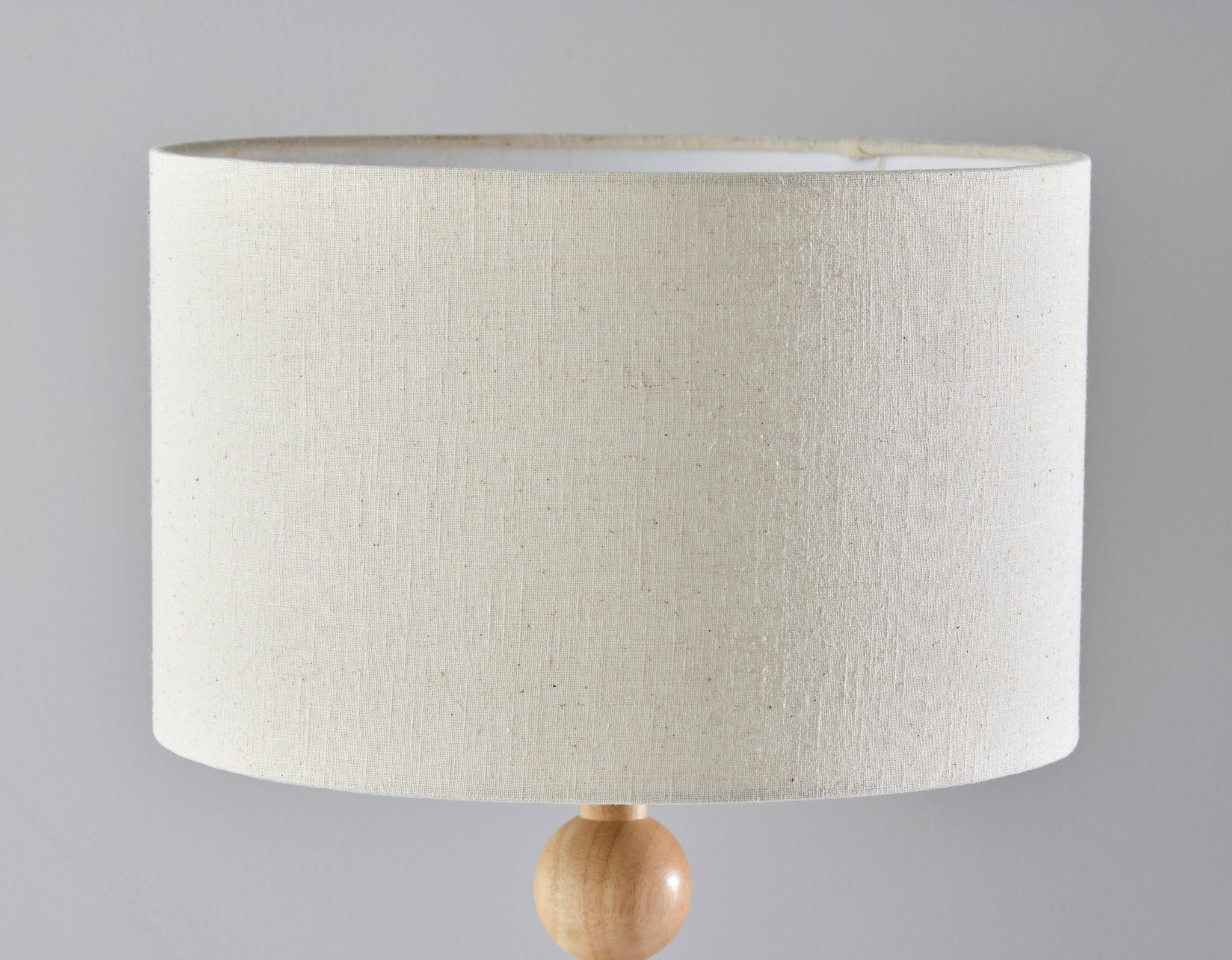 28" Brown Solid Wood Candlestick Table Lamp With Off White Drum Shade
