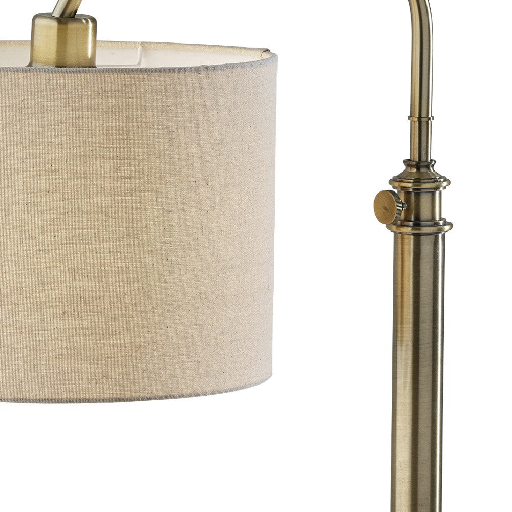 32" Antiqued Brass Metal Adjustable Cylinder Arched Table Lamp With Beige Drum Shade
