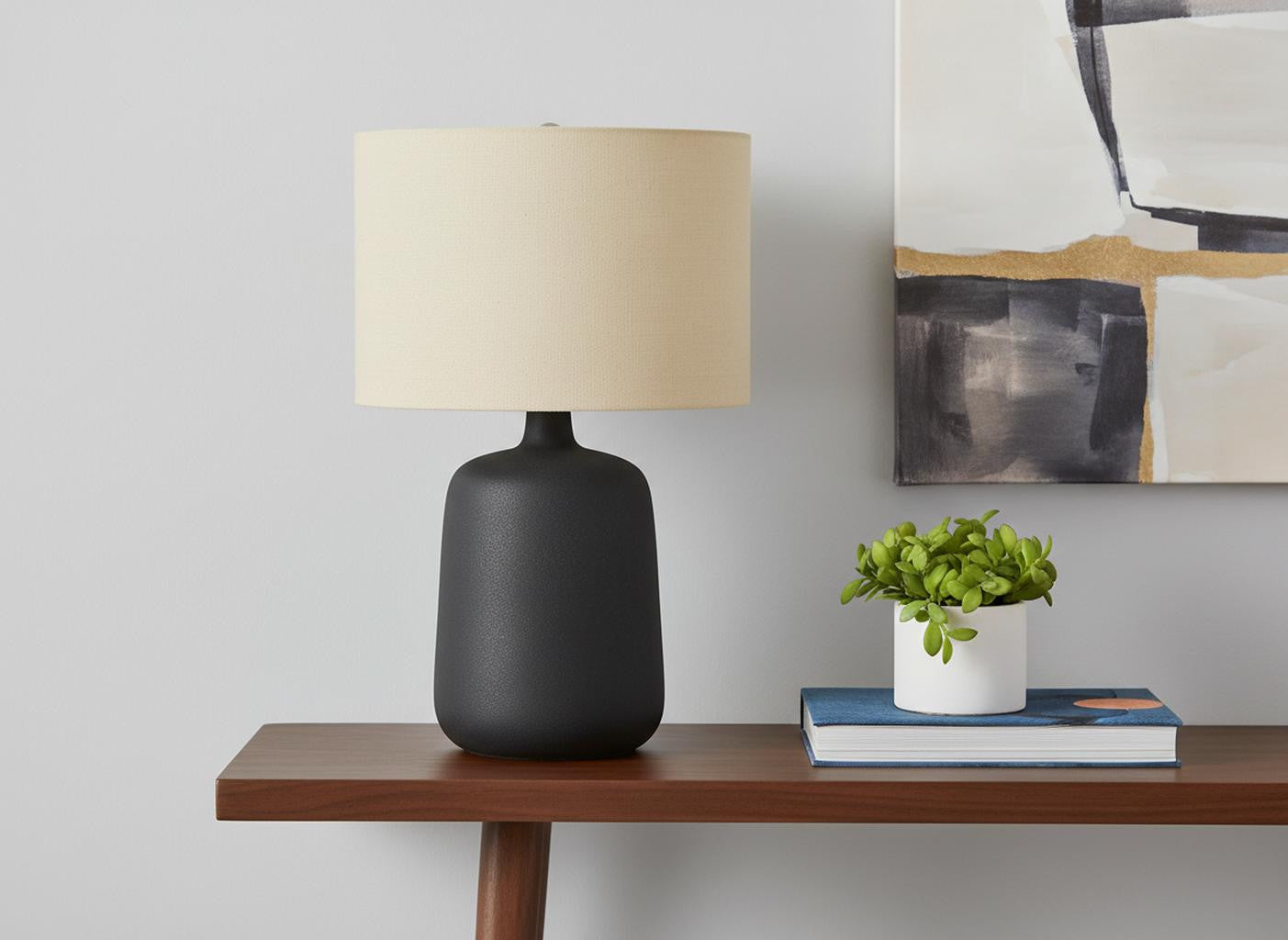 24" Black Ceramic Round Table Lamp With Beige Drum Shade